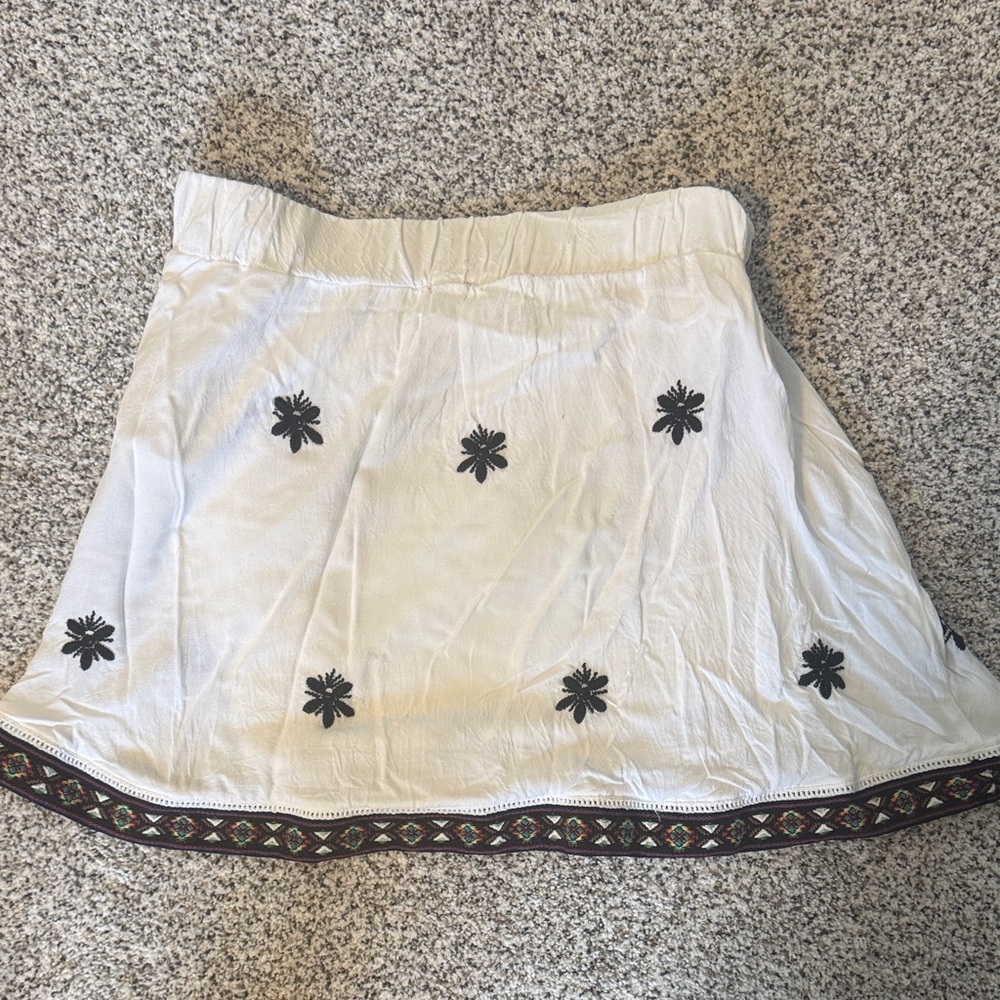 A. Peach White Embroidered Skirt with Decorative Hem